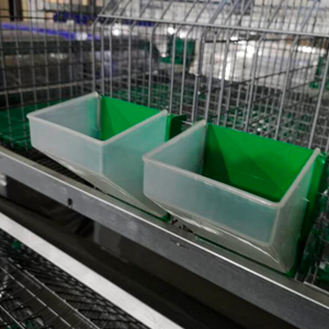 Кол менен азыктандырылган коён жем салгыч - үстүнө орнотулган